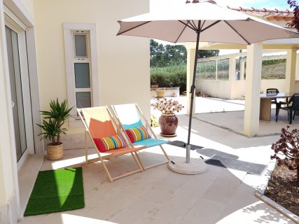 Outdoor sunbathing or relax place by the pool