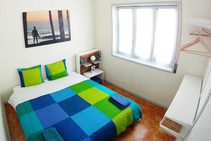 single or couple bed room with street view